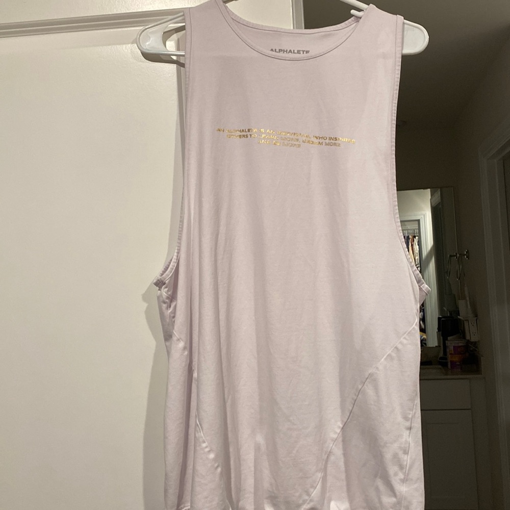 Alphalete drop arm tank